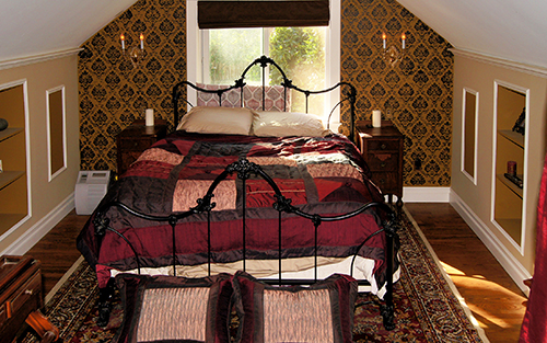 This is a converted attic in an English Cottage style residence in the town of Martinez, CA.